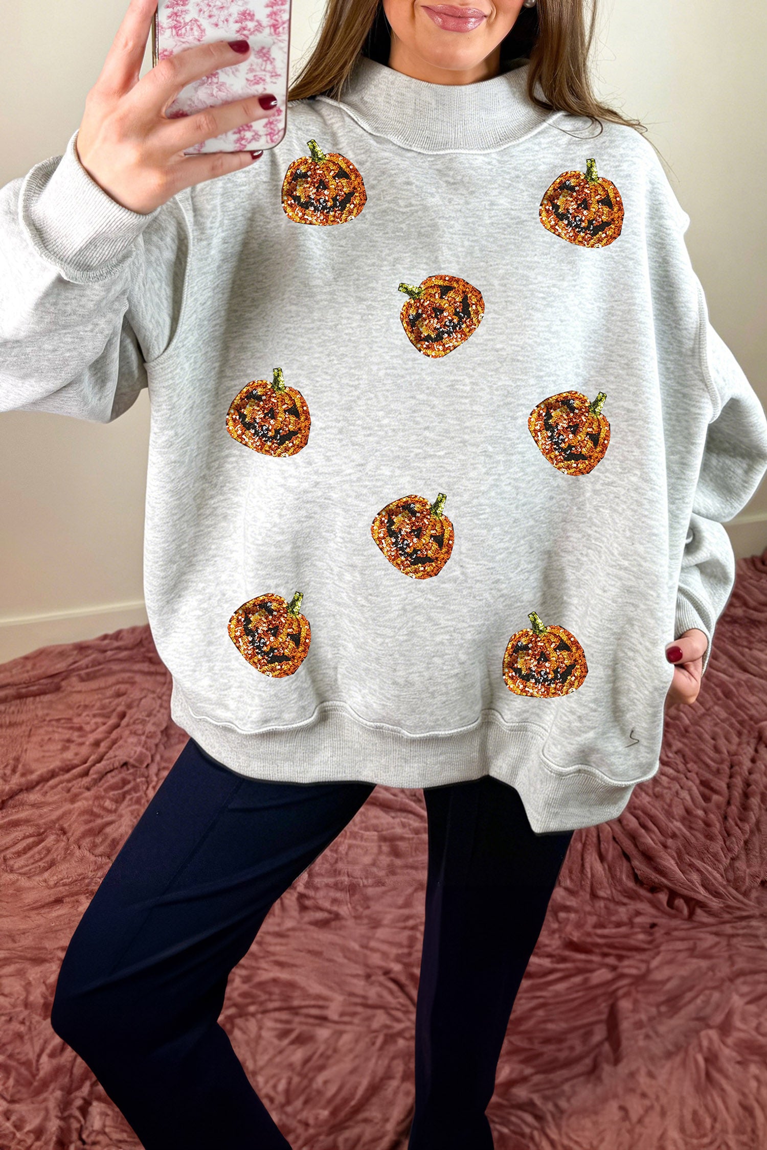 Light Grey Sequined Halloween Pumpkin Graphic Exposed Seam Mock Neck Sweatshirt