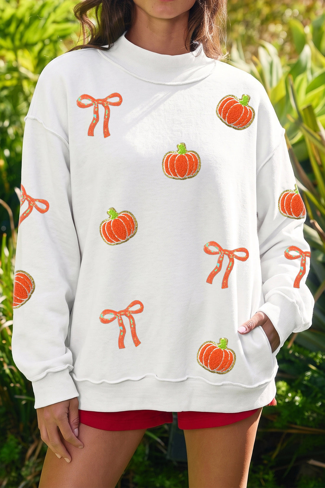 White Chenille Pumpkin Sequin Bow Graphic Exposed Seam Mock Neck Sweatshirt