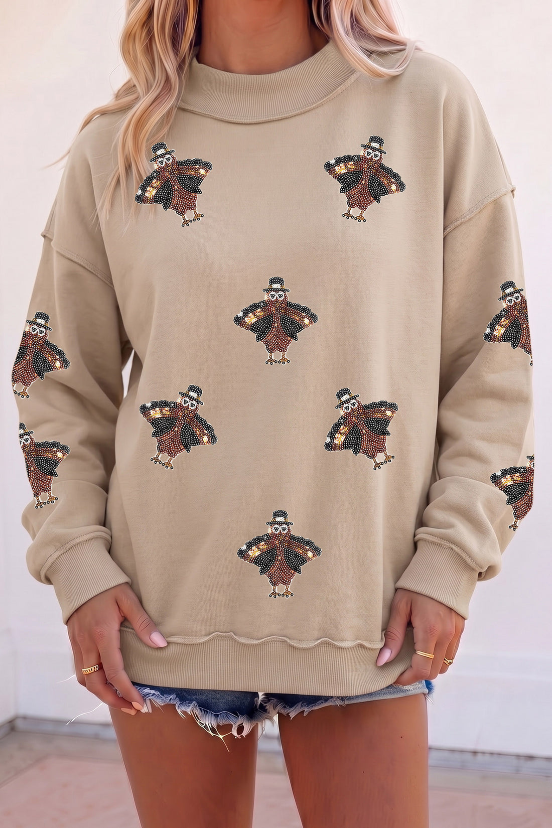 Apricot Sequin Turkey Graphic Mock Neck Exposed Seam Pullover Sweatshirt