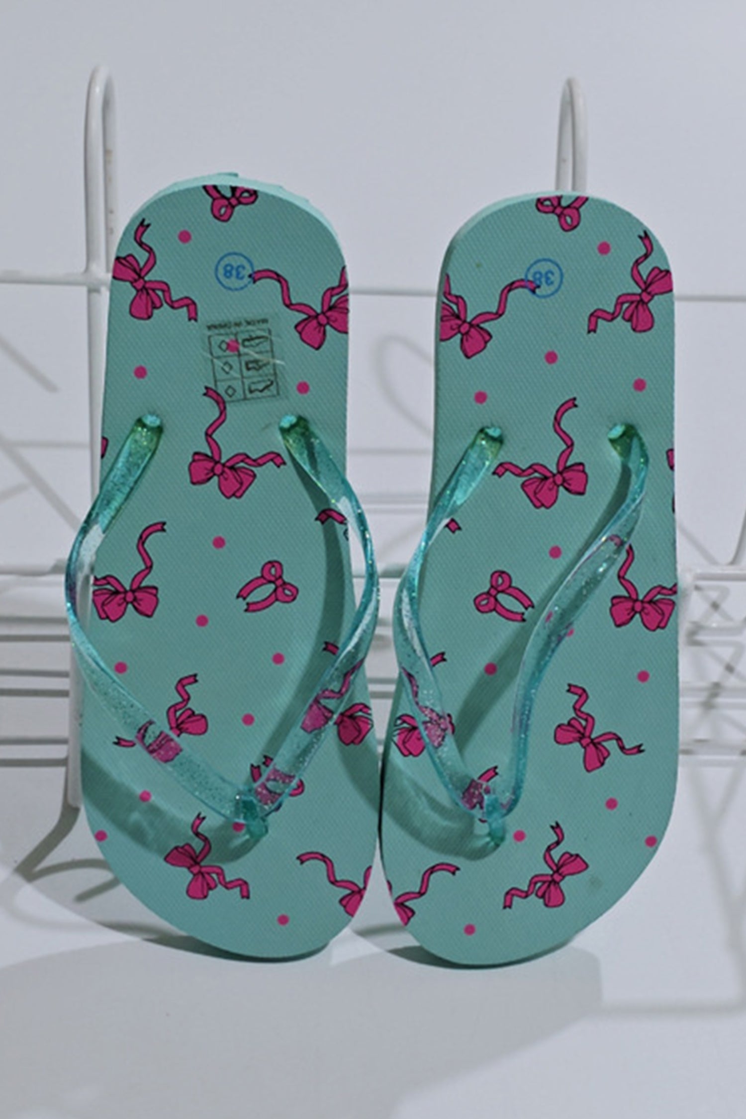 Iceland Blue Bow Printed Clear Jelly Straps Flip Flops