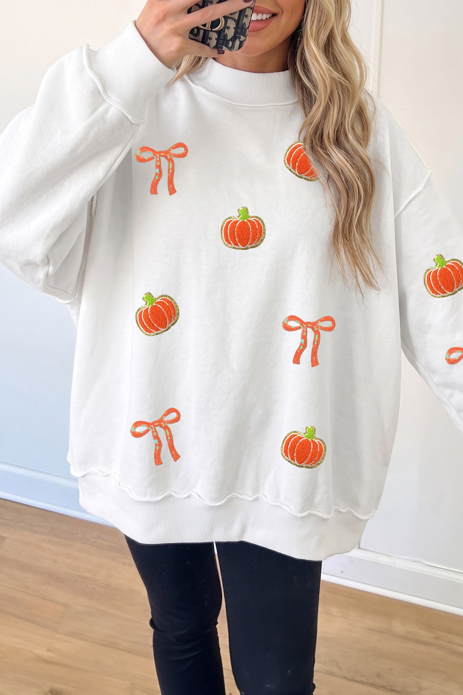 White Chenille Pumpkin Sequin Bow Graphic Exposed Seam Mock Neck Sweatshirt