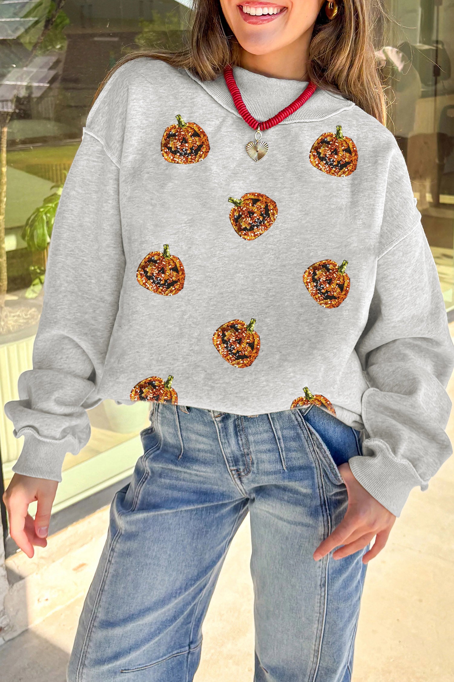 Light Grey Sequined Halloween Pumpkin Graphic Exposed Seam Mock Neck Sweatshirt