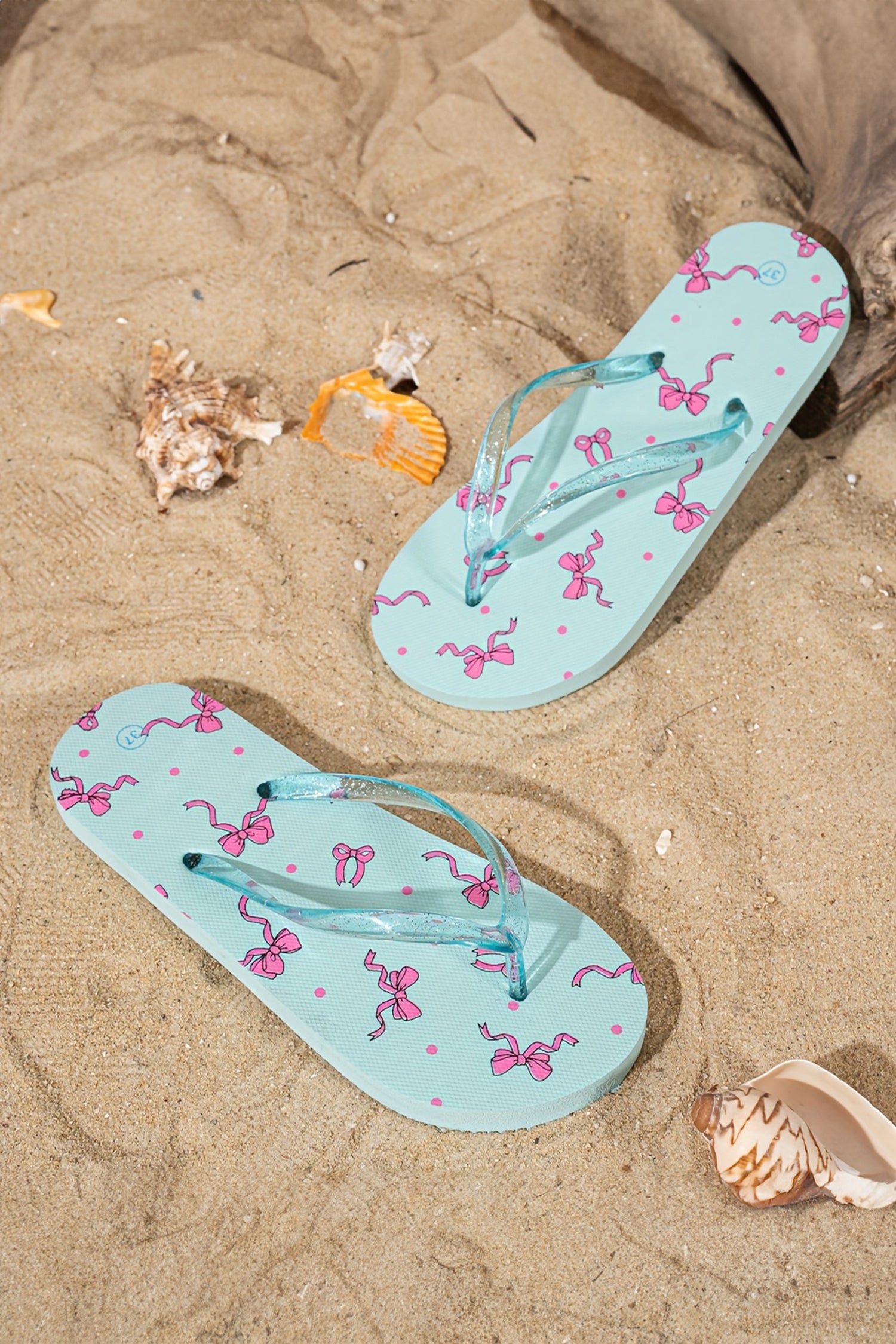 Iceland Blue Bow Printed Clear Jelly Straps Flip Flops