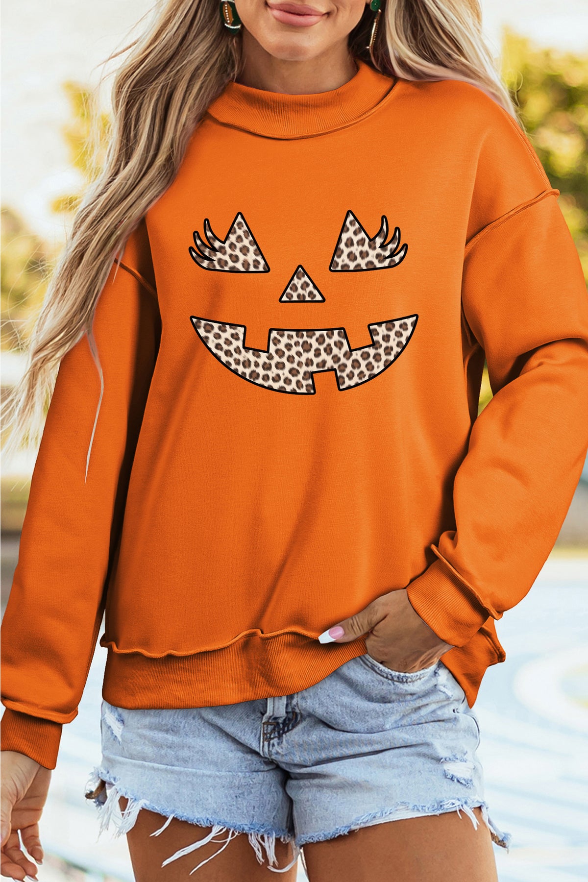 Carrot Leopard Halloween Pumpkin Face Printed Exposed Seam Mock Neck Sweatshirt