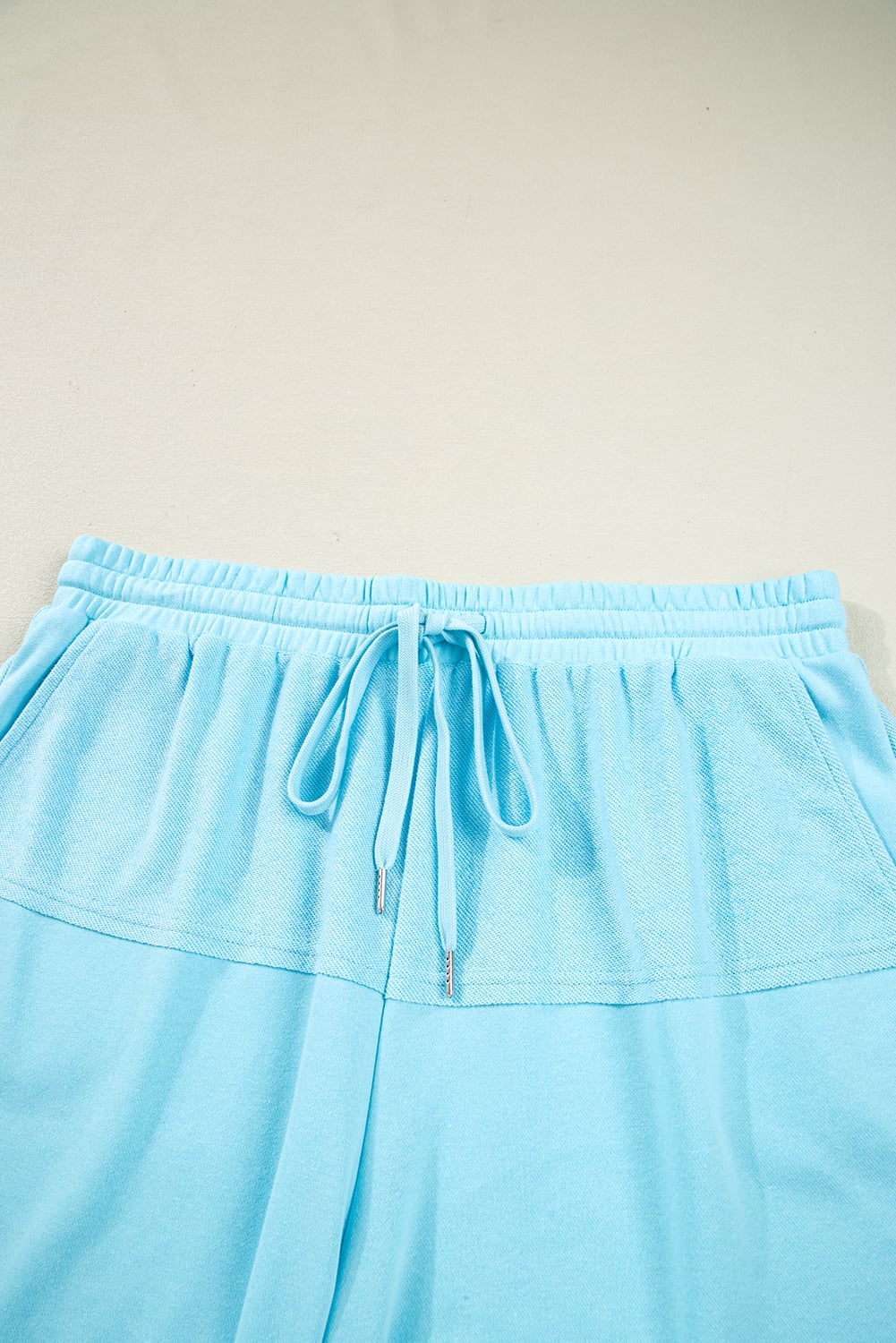 Aruba Blue Plus Size Solid Color Splicing Raw Hem Pullover Top Shorts Set