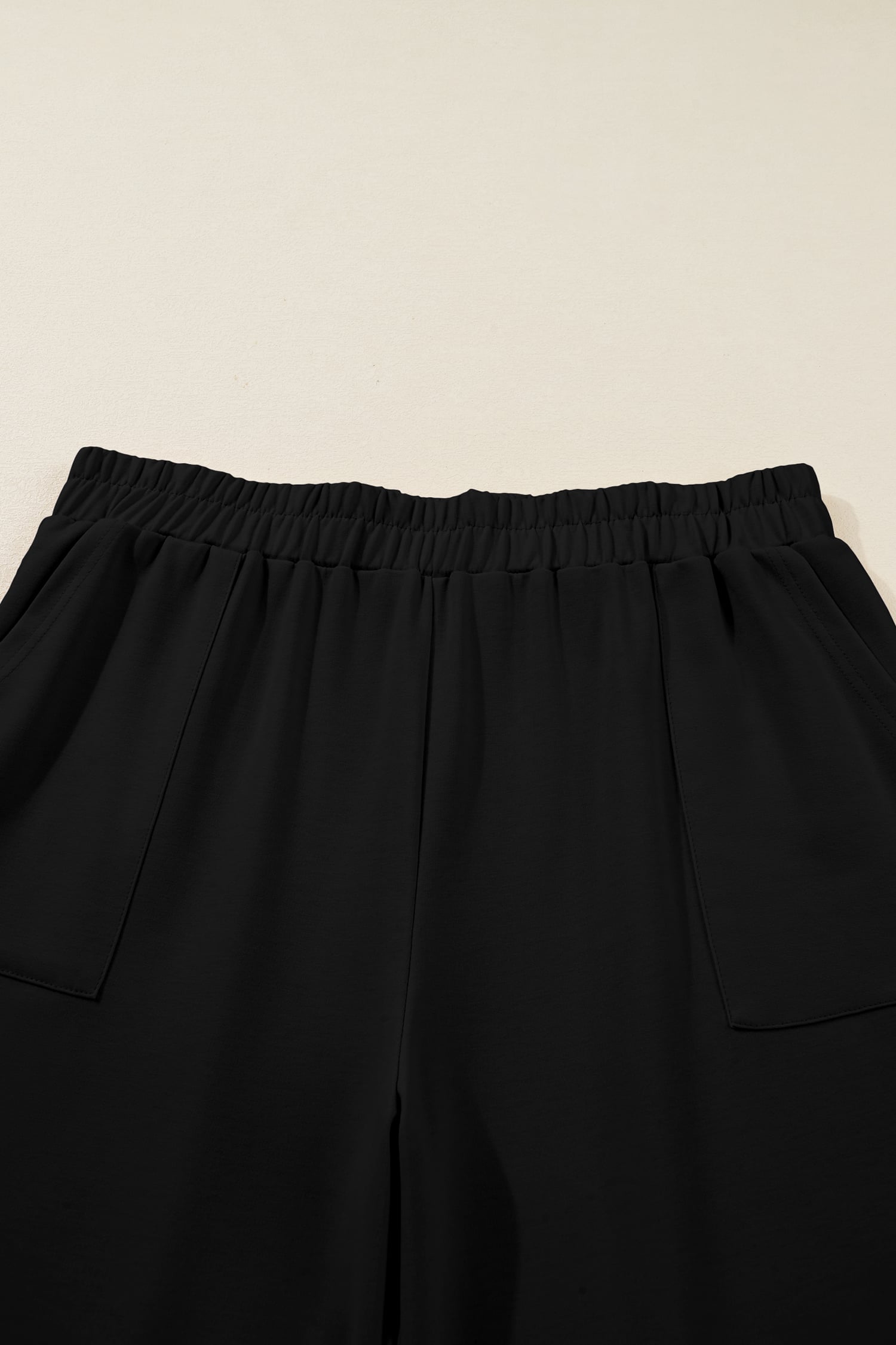 Black Plus Size Elastic Waist Asymmetrical Hem Loose Capris Pants