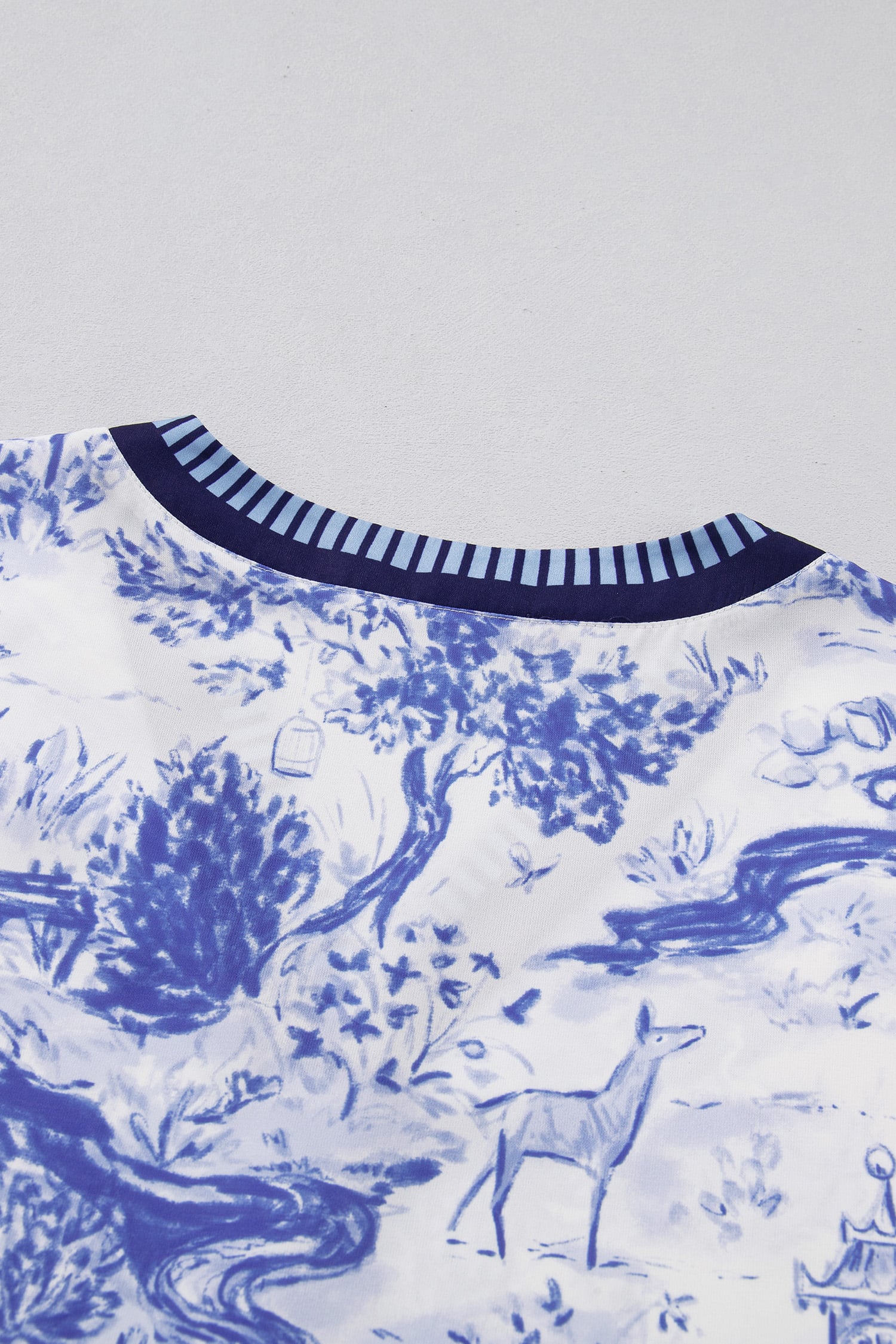 Blue Wild Animal Paradise Striped Trim V Neck Short Sleeve Blouse