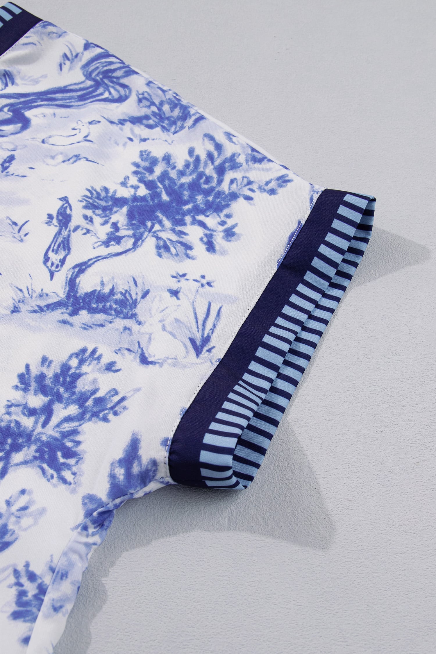 Blue Wild Animal Paradise Striped Trim V Neck Short Sleeve Blouse