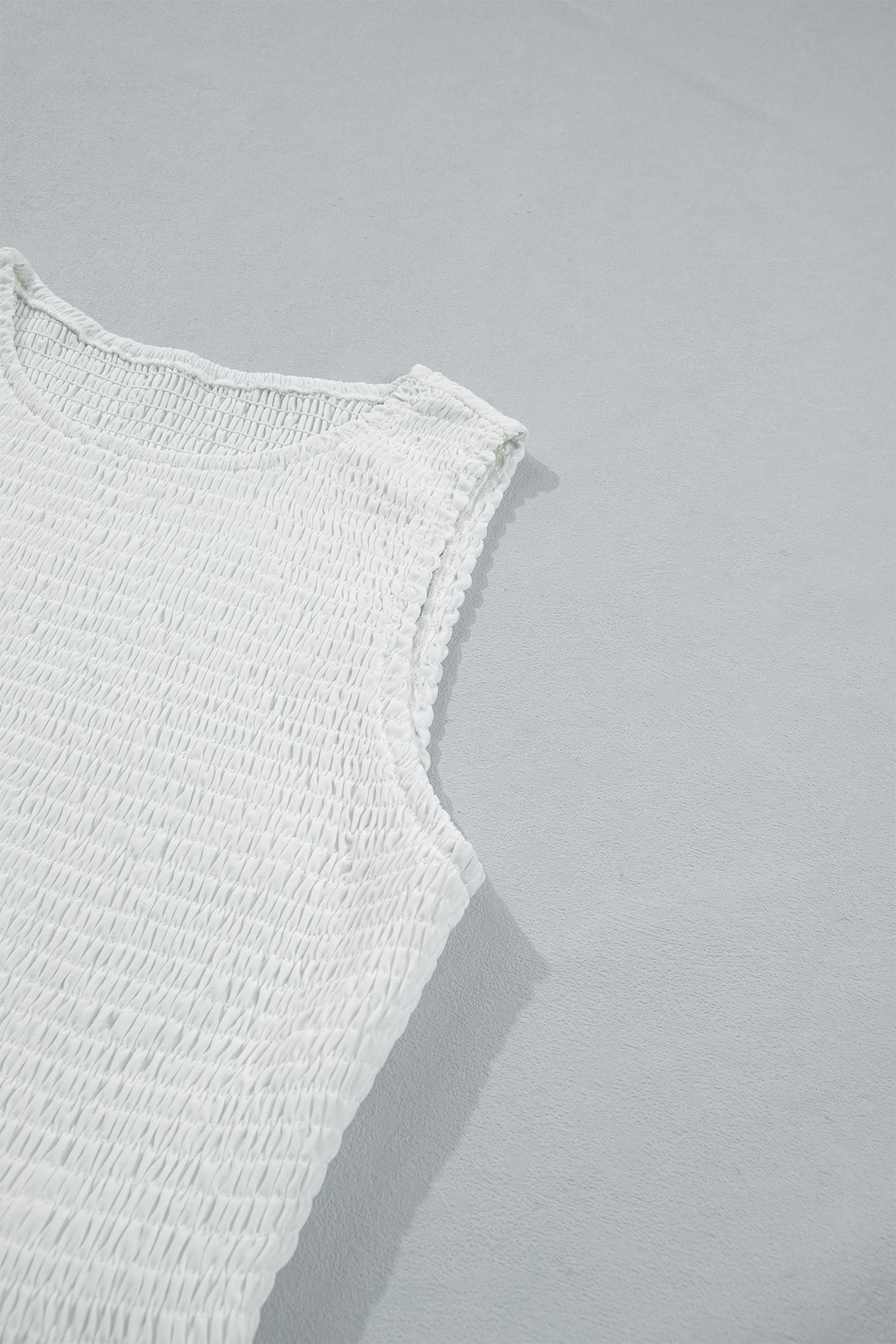White Sleeveless Smocked Lace Peplum Top