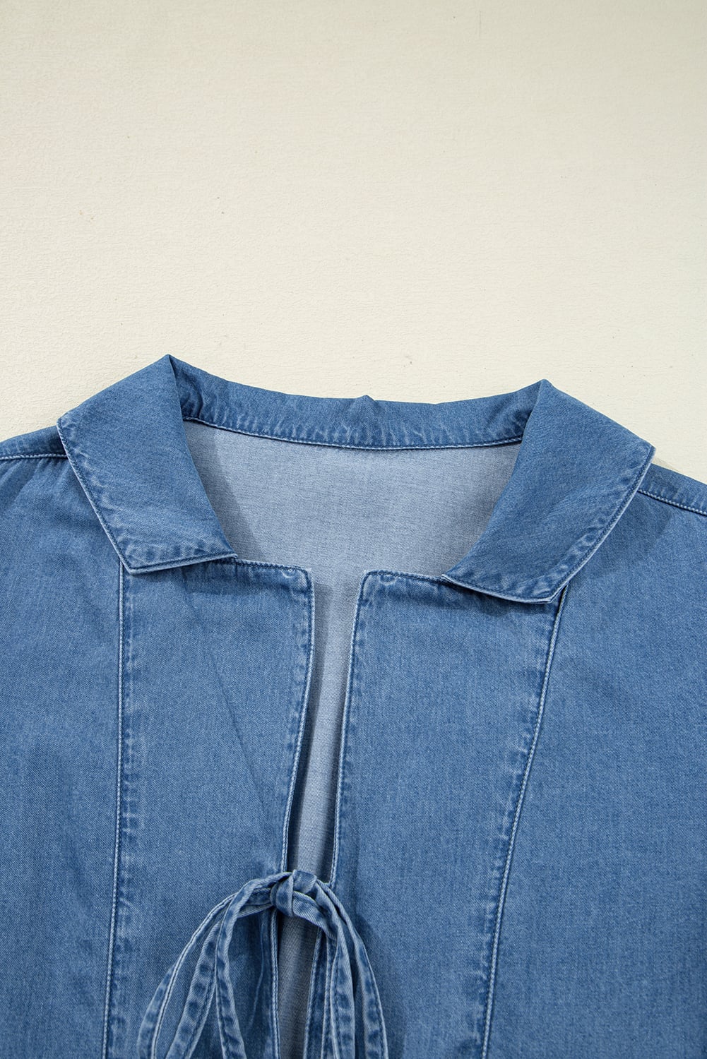 Dusk Blue Denim Lapel Neck Balloon Sleeve Tied Peplum Top