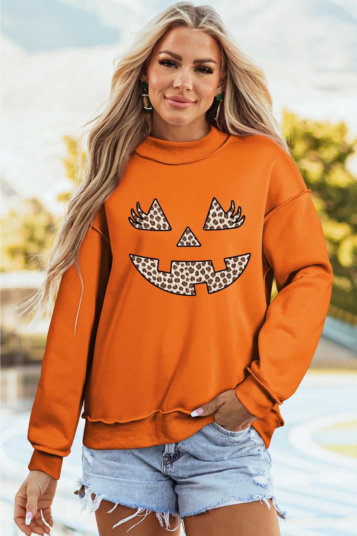 Carrot Leopard Halloween Pumpkin Face Printed Exposed Seam Mock Neck Sweatshirt