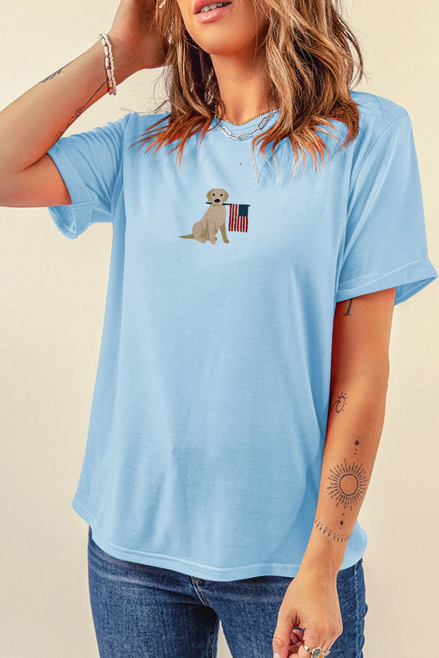 Light Blue Embroidered Dog Holding American Flag Graphic T Shirt