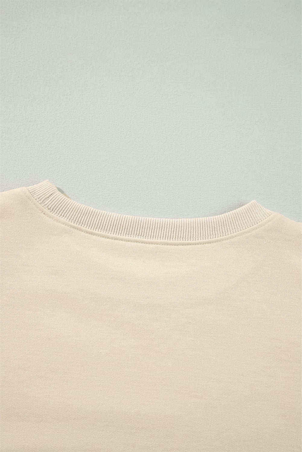 Jet Stream Solid Color Ruffled Shoulder Long Sleeve Blouse
