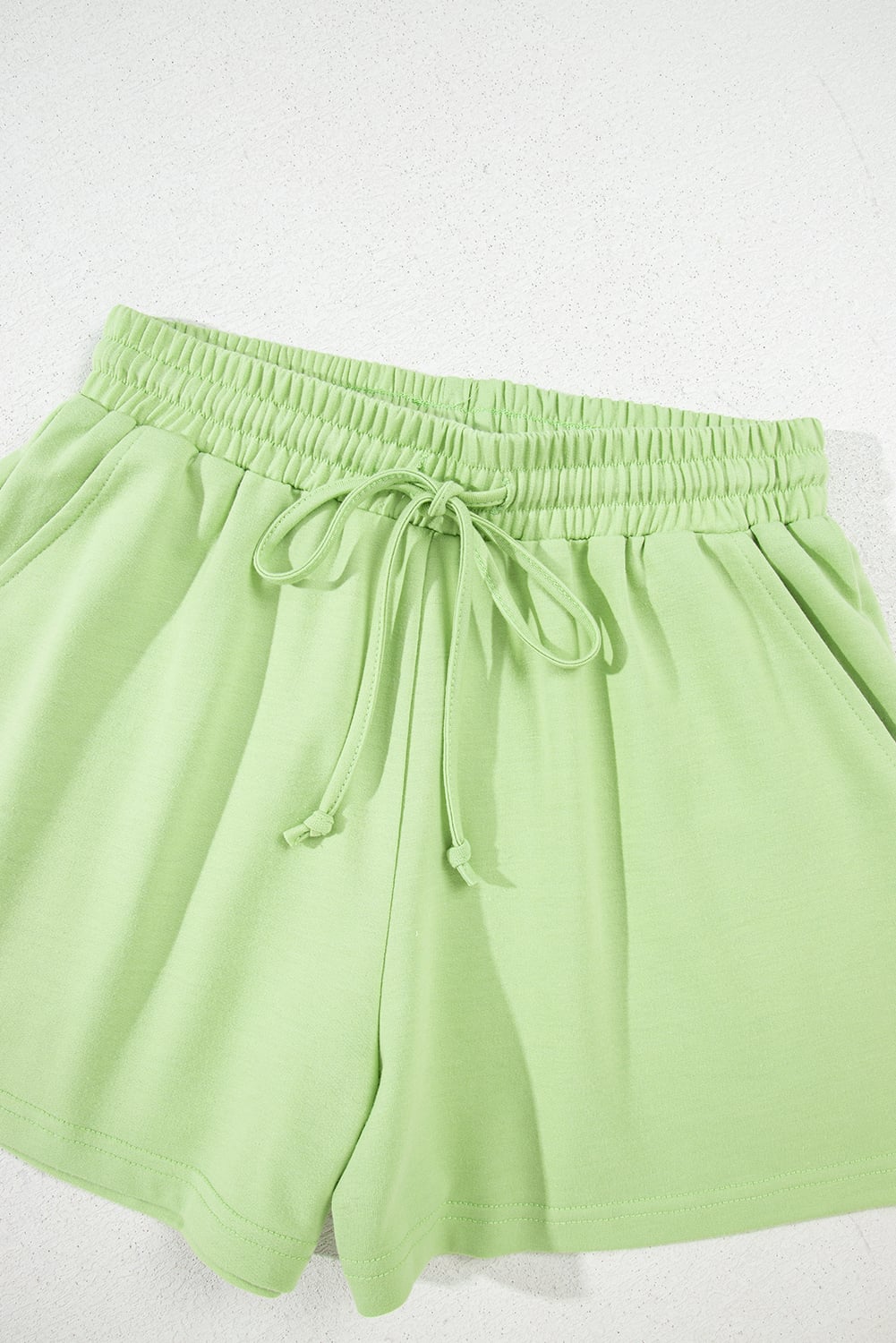 Meadow Mist Green Solid Loose V Neck Half Sleeve Tee and Shorts