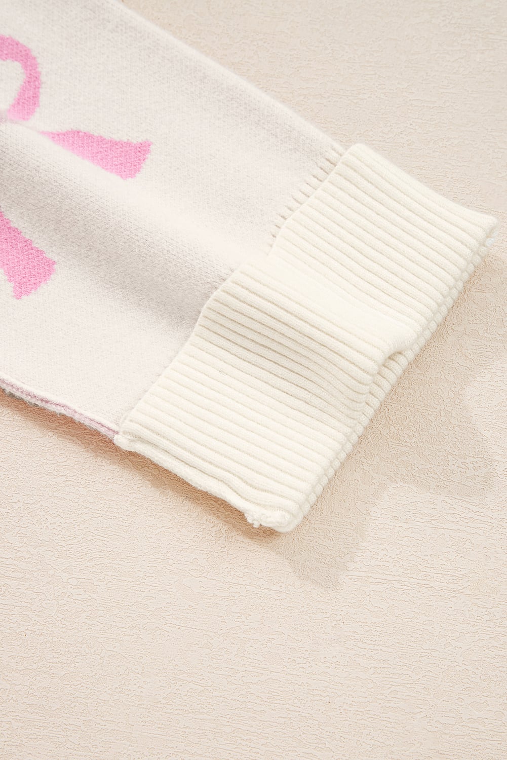 Pink Bow Print Ribbed Trim Exposed Seam Drop Shoulder Loose Sweater