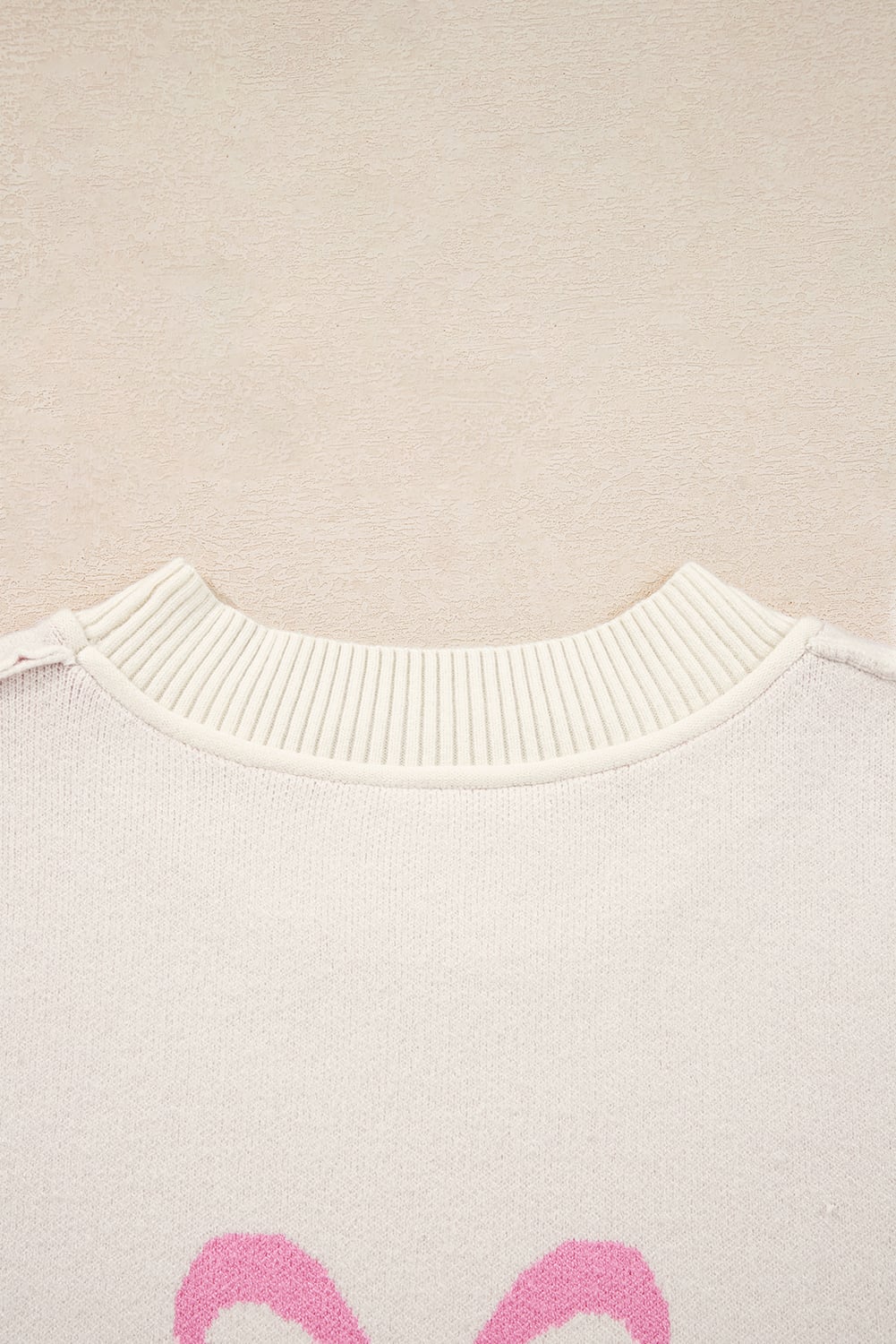 Pink Bow Print Ribbed Trim Exposed Seam Drop Shoulder Loose Sweater