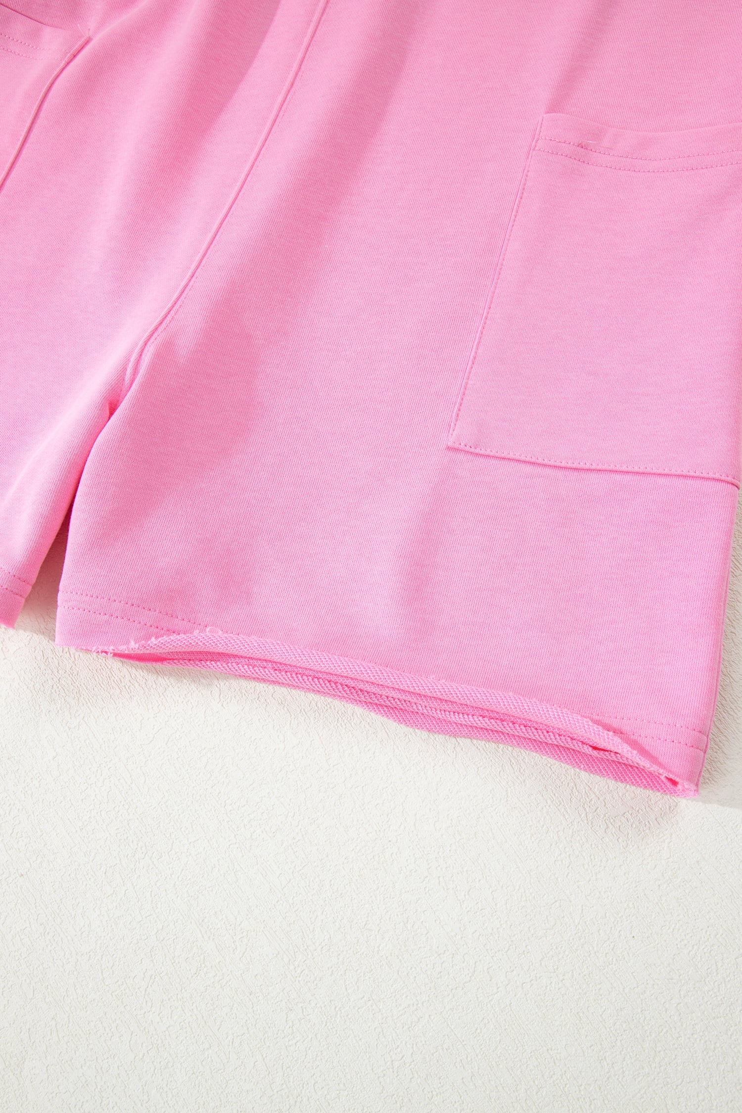 Pink Solid Color Raw Edge Half Sleeve Pocketed Loose Romper