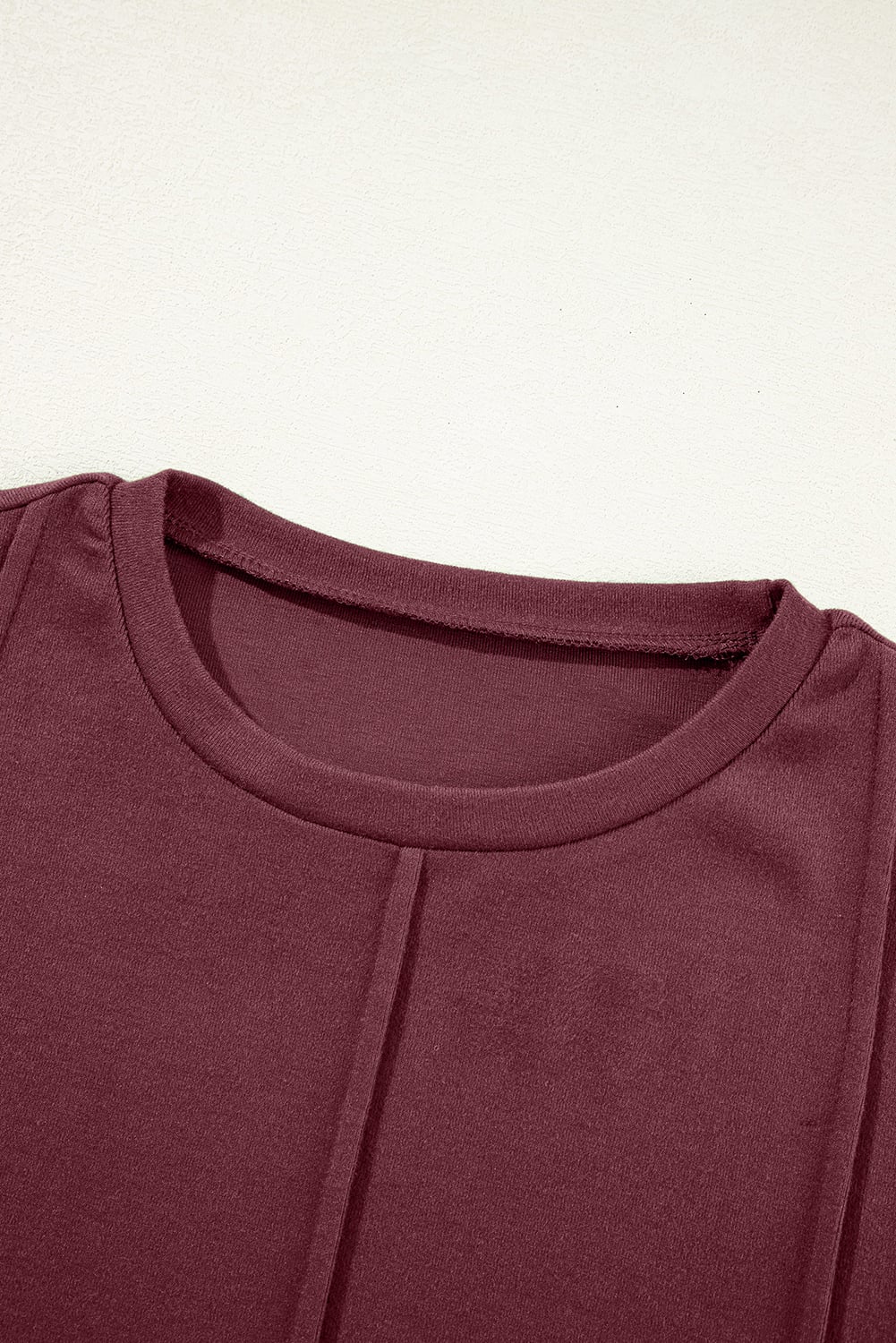 Red Dahlia Solid Exposed Seam Crew Neck Long Sleeve Top