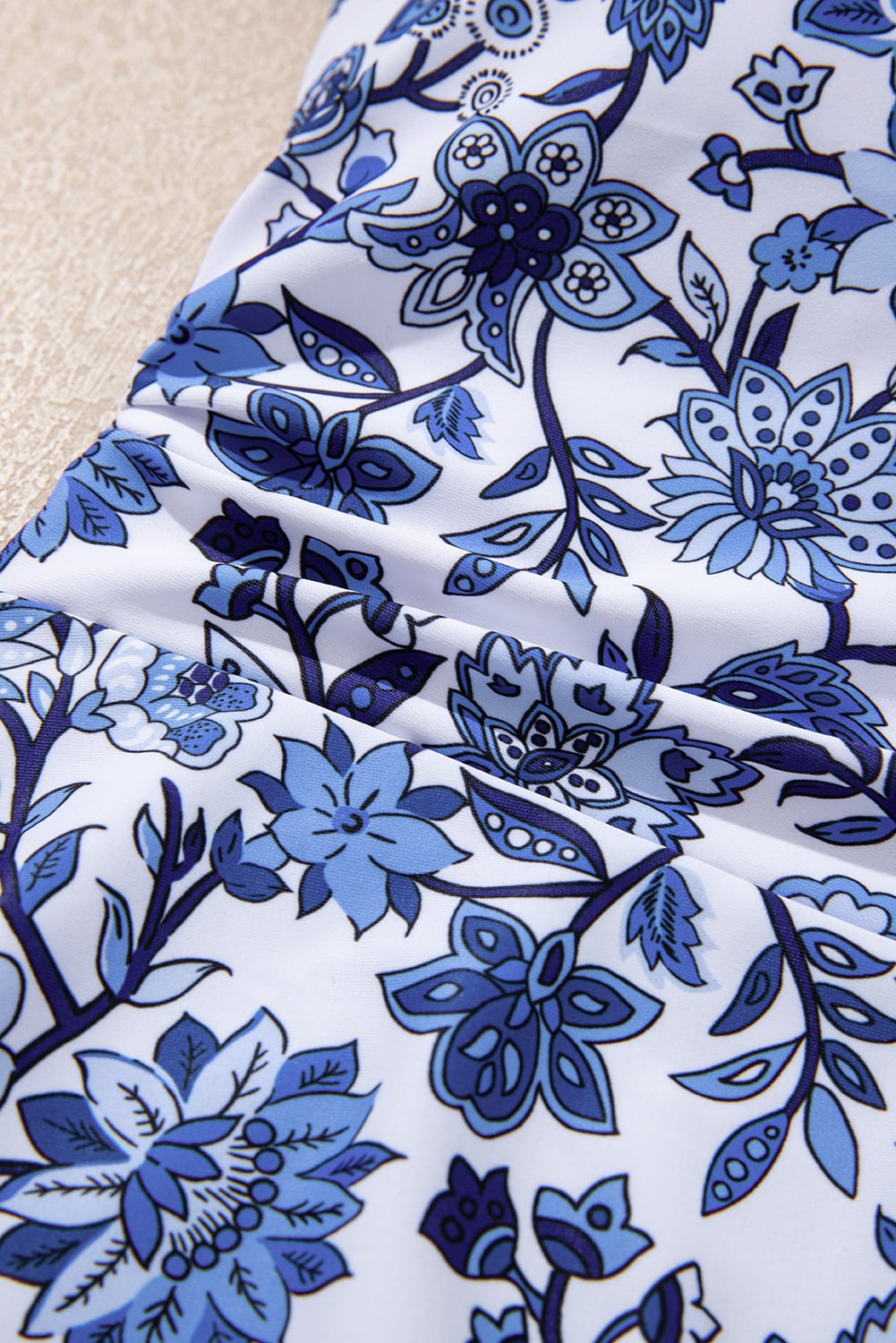 Sky Blue Crossed Back Floral Print Asymmetric Knot Side One Piece Swimsuit