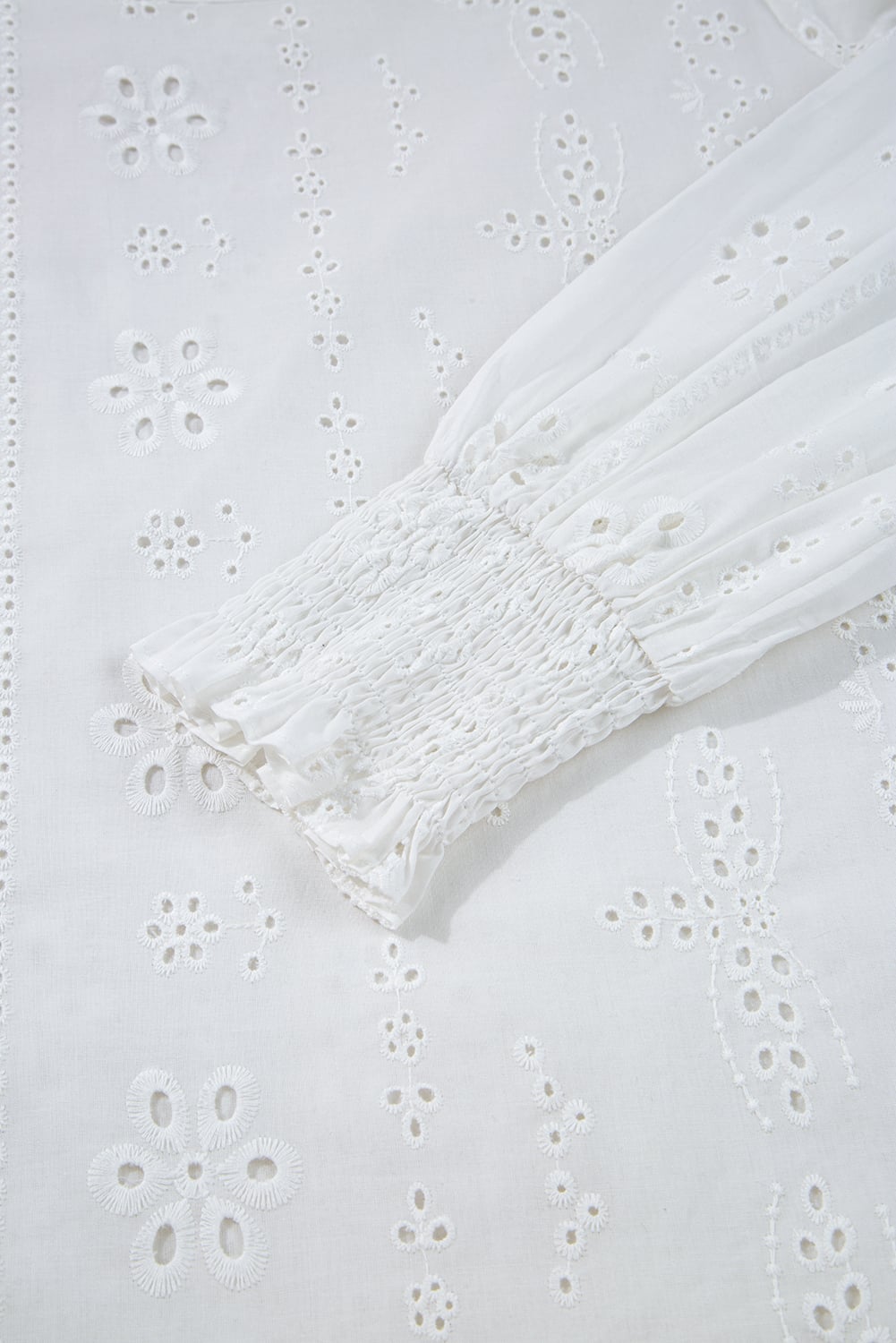 White Eyelet Embroidered Smocked Cuff Sheer Blouse