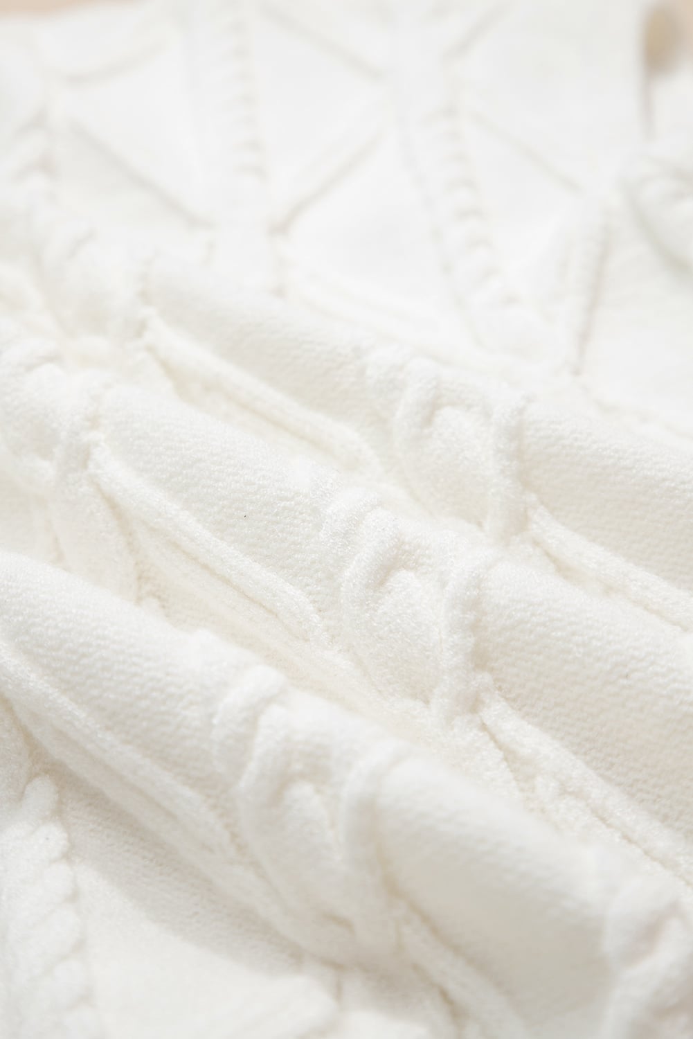 White Pearled High Neck Textured Knit Sweater Vest